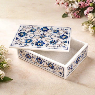 Handcrafted white marble jewelry box with blue floral inlay design and removable lid.