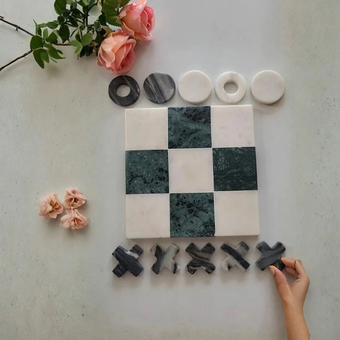 Artisan marble tic-tac-toe game board showcasing natural stone textures