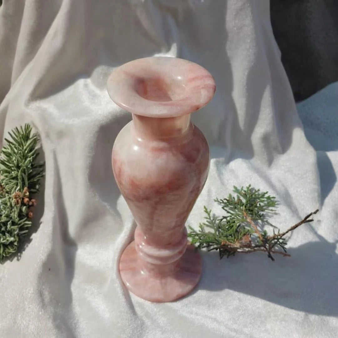 Premium handcrafted marble flower vase with organic blush tones, styled for upscale living room decor.